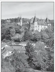  ?? Rick Steves’ Europe/CAMERON HEWITT ?? The medieval Chateau de la Rochepot rises above its village in the heart of Burgundy’s wine country.