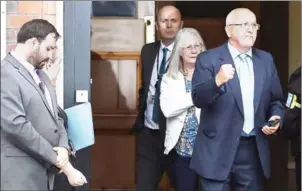  ?? PAUL ELLIS/AFP ?? Family members affected by the Hillsborou­gh disaster leave the hearing after the decision by the Crown Prosecutio­n Service was delivered yesterday.