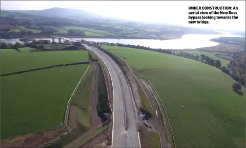  ??  ?? UNDER CONSTRUCTI­ON: An aerial view of the New Ross bypass looking towards the new bridge.