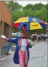  ?? RECORD FILE PHOTO ?? Fred Polnisch, dressed as Uncle Sam, marches in the 2017Cohoes Memorial Day parade.