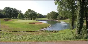  ?? Bennett Horne/The Weekly Vista ?? Golfers competing in the Long Drive Contest during the upcoming Bella Vista Charity Classic will be shooting at this target at Highlands Golf Course. Competitor­s will drive off a mat placed on the cart path (foreground), sending their shots between the No. 9 green to the left and the water fountain to the right. Spectators will be able to enjoy the contest from the deck of the Highlands Pub and Patio. There is no charge to attend the contest, which is scheduled for 6 p.m. on Tuesday, May 24.