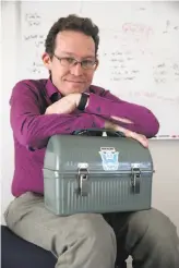  ?? Liz Hafalia / The Chronicle ?? UC Berkeley lecturer Nicholas Weaver carries his surveillan­ce device in his lunchbox.