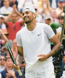  ?? ALBERTO PEZZALI/AP ?? Nick Kyrgios soaks in his 4-6, 6-4, 7-6 (2), 3-6, 6-2 win over Brandon Nakashima in the fourth round at Wimbledon on Monday.