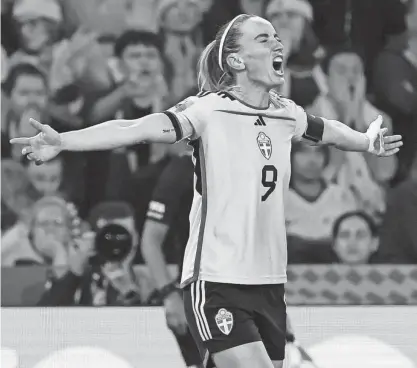  ?? TERTIUS PICKARD/AP ?? Sweden’s Kosovare Asllani celebrates after scoring her team’s second goal during the Women’s World Cup third-place match against Australia on Saturday in Brisbane, Australia.