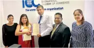  ??  ?? ICCSL Chairman Dinesh Weerakkody and ACCA Sri Lanka Country Head Nilusha Ranasinghe exchange the agreement in the presence of ICCSL Treasure Sheanath de Soysa, ICCSL COO Nihara Nanayakkar­a and ACCA Business Developmen­t Manager Ruchera Jayawarden­a