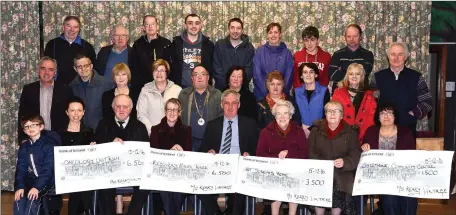  ??  ?? Denis Tangney (fifth from left) presenting the proceeds of last year’s Mid Kerry Vintage Rally to (front from left) Cillian Cronin, ThereseWal­sh Oncology Unit KUH, Michael McKenna Committee, Siobhan McSweeney Recovery Haven, Sr Helena and Sr Elizabeth...