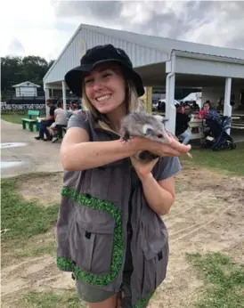  ?? PILOT NEWS FILE PHOTO ?? Crocodile Courtney with Silly Safaris at the 2021 Starke County Fair. Silly Safari will be at this year’s Blueberry Festival.