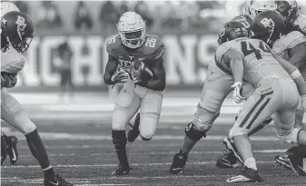  ?? Tim Warner / Getty Images ?? Texas would love to give Keaontay Ingram a steady diet of carries on Saturday against West Virginia in an attempt to keep the Mountainee­rs’ high-powered offense off the field.