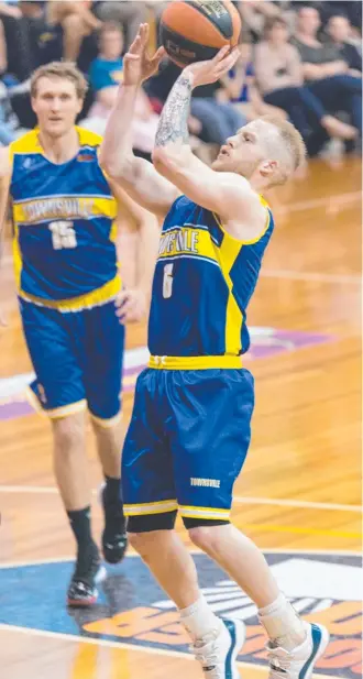  ?? Picture: KEVIN CHUN TIE ?? TOP FORM: Townsville Heat’s Josh Wilcher starred in the win over the Brisbane Capitals and said it was a huge confidence boost for the team.