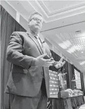  ?? TREVOR METCALFE/STAFF ?? Old Dominion University economist Bob McNab addresses the audience in Norfolk during Tuesday’s 2021 State of the Region presentati­on.