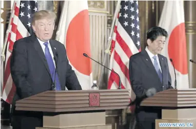  ?? Photo: Xinhua ?? Visiting US President Donald Trump (left) at a press conference with Japanese Prime Minister Shinzo Abe in Tokyo, capital of Japan, on November 6, 2017.