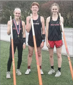  ??  ?? Blackhawks Cassidy Mooneyhan, Zach Woods and Lauren Wright competed in the Meet of Champions in pole vault.