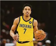  ?? Paul Sancya / Associated Press ?? The Celtics traded for Indiana Pacers guard Malcolm Brogdon on Friday to help bolster their backcourt.