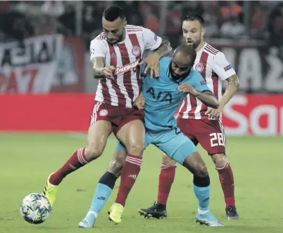  ?? Picture: EPA-EFE ?? THE BALL IS MINE. Olympiacos’ Guilerme (L) in action against Tottenham Hotspur’s Lucas Moura during their Uefa Champions League group B match at Karaiskaki stadium in Piraeus, Greece, last night.