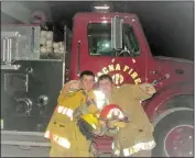  ?? LOANED PHOTO/ PELFREY FAMILY ?? BROTHERS COLT AND CODY PELFREY are seen here in this photo hanging out at the Tacna Fire Department while they were in high School.