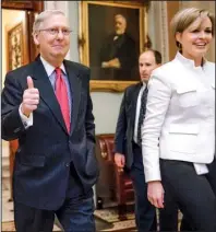  ?? AP/ J. SCOTT APPLEWHITE ?? Senate Majority Leader Mitch McConnell leaves the Senate chamber after Thursday’s vote on changing the fi libuster rule. He accused Democrats of trying to politicize the courts and confi rmations.