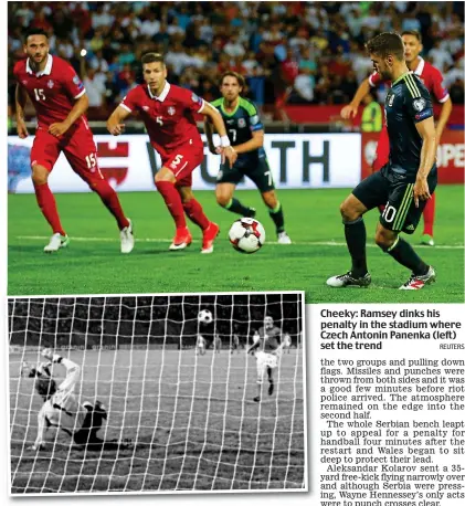  ??  ?? Cheeky: Ramsey dinks his penalty in the stadium where Czech Antonin Panenka (left) set the trend