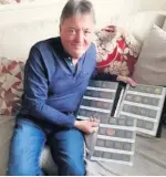  ??  ?? ●● Bill Bennett with some of his collection of colliery tokens