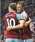  ??  ?? DANGEROUS DUO: Burnley’s Ashley Barnes and Chris Wood celebrate