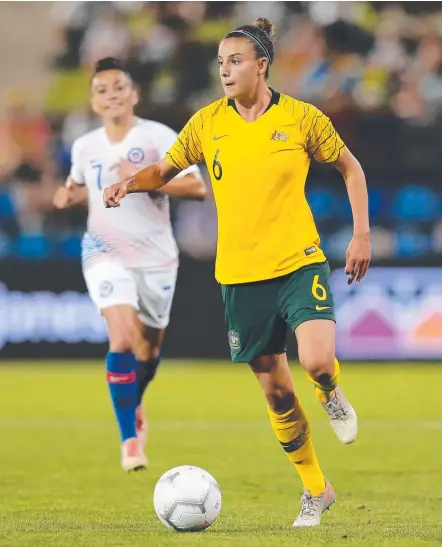  ?? Picture: GETTY IMAGES ?? Chloe Logarzo, in action against Chile last month, says the Matildas can win the World Cup.