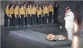  ?? — AP/PTI ?? Prime Minister Narendra Modi pays respects during his visit to the Yad Vashem Holocaust Memorial in Jerusalem on Tuesday.