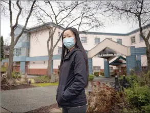  ??  ?? The Canadian Press
Bernadette Cheung seen outside Little Mountain Place, where her grandmothe­r who passed away was a resident, in Vancouver, on Thursday.