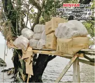  ??  ?? MINYAK masak yang disorok berjaya dirampas PPM di Sandakan.