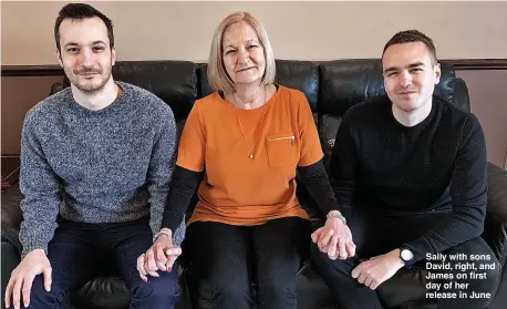  ??  ?? Sally with sons David, right, and James on first day of her release in June