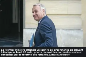  ?? [LIONEL BONAVENTUR­E/AFP] ?? Le Premier ministre a!chait un sourire de circonstan­ce en arrivant à Matignon, lundi 26"août, pour y recevoir les partenaire­s sociaux concernés par la réforme des retraites.