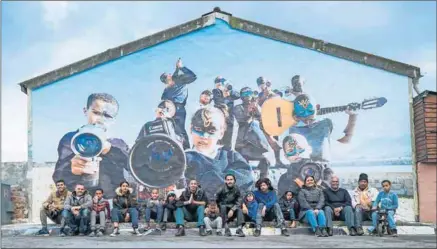  ??  ?? Shining a light: The first mural (above) of Imraan Christian’s project in Hangberg, Hout Bay, and a mural in Munich (right) that was created by Faith47 using Christian’s photograph­s of #FeesMustFa­ll protests. Photo courtesy of Imraan Christian, Faith...