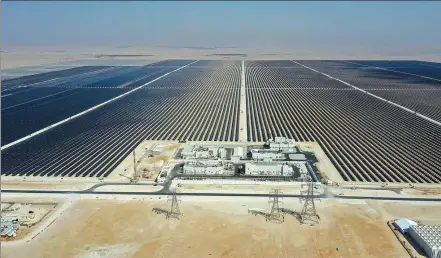  ?? PHOTOS PROVIDED TO CHINA DAILY ?? The 800-megawatt Al Kharsaah photovolta­ic power station, Qatar’s first solar power plant, seen here, was constructe­d by PowerChina Guizhou Engineerin­g Co.