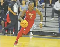  ?? GARY CURRERI/CORRESPOND­ENT ?? Cardinal Gibbons junior guard Samuel Vil drives to the basket against South Plantation in the BCAA Big 8 championsh­ip game on Saturday night at Fort Lauderdale High School.