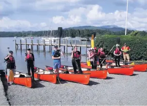  ??  ?? Some of the Year 10 pupils from Beech Hall School who paddled the length of Windermere to help raise money for suicide prevention charity PAPYRUS
