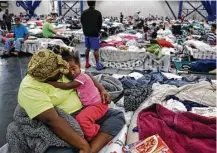  ?? Michael Ciaglo / Houston Chronicle ?? More than 10,000 people took shelter at the George R. Brown Convention Center during Hurricane Harvey. “The need was so great,” Ullrich says.