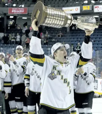  ?? CRAIG GLOVER/LONDON ?? London forward Mitch Marner hoists the OHL Championsh­ip trophy as the team celebrates their most recent league title in May 2016. A proposed scheme to pay CHL players minimum wage could have the effect of increasing the dominance of teams like the...