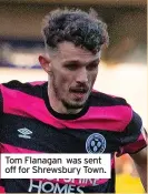  ?? ?? Tom Flanagan was sent off for Shrewsbury Town.