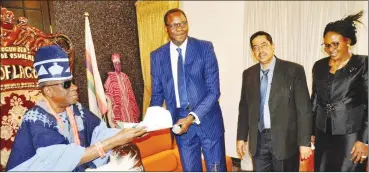  ??  ?? Director General, Consumer Protection Council (CPC), Babatunde Irukera, presenting materials for the launch of the National Campaign and Advocacy for Quality in Nigeria to the Oba of Lagos, His Royal Majesty ( HRM), Oba Rilwan Akiolu while UNIDO Chief...