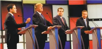  ?? Paul Sancya / Associated Press 2016 ?? GOP presidenti­al hopefuls Sen. Marco Rubio (left) of Florida, Donald Trump, Sen. Ted Cruz of Texas and Ohio Gov. John Kasich debate in Detroit in 2016.