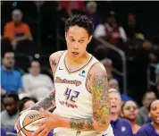  ?? Matt York/Associated Press ?? Phoenix Mercury center Brittney Griner looks to pass during the first half of a preseason game against the Los Angeles Sparks on May 12 in Phoenix.