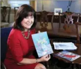  ?? MANUEL BALCE CENETA — THE ASSOCIATED PRESS ?? Karen Pence, wife of Vice President Mike Pence, shows her artwork during an interview with The Associated Press in her office at the Eisenhower Executive Office Building on the White House complex in Washington.