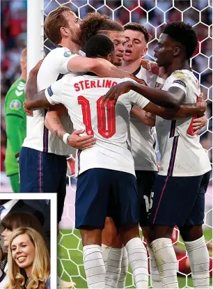  ??  ?? Breakthrou­gh... England stars celebrate, above; Boris and Carrie, left, and, below, fans go wild in Manchester