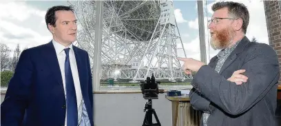  ??  ?? ●● Mr Osborne chats with Professor Tim O’Brien in the telescope control room