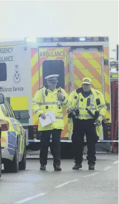  ??  ?? Emergency services at the scene on Piersfield Terrace after a woman was involved in an accident with a bin lorry