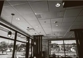  ?? Marie D. De Jesús / Staff photograph­er ?? UV Angel Clean Air technology is part of the ceiling at a McDonald’s in Baytown. The technology uses ultraviole­t light to purify air.