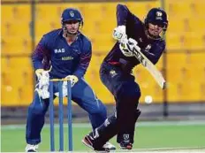  ?? Ahmed Kutty/Gulf News ?? UAE’s Rohan Mustafa in action during the Desert T20 tournament against Namibia at the Zayed Cricket Stadium in Abu Dhabi on Sunday night.