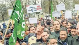  ?? PTI ?? Members of People's Democratic Party protest against the harassment­s of Kashmiris including students following the Pulwama terror attack in Srinagar on Sunday.