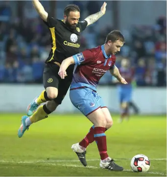  ??  ?? Drogheda United’s Luke Gallagher holds off Rovers’ Raffaele Cretaro. Photo: Paul Connor