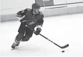  ??  ?? The Coyotes' Taylor Hall skates against the Kings during the third period at Gila River Arena in Glendale on Jan. 30.