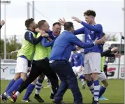  ??  ?? Ashford manager Clifton Conyard goes to celebrate with Dean Mooney.