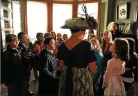  ??  ?? Museum docent Steph MacCarter dressed up as Molly Brown to give a guided tour to fifth graders from Upper Blue Elementary School in Breckenrid­ge.